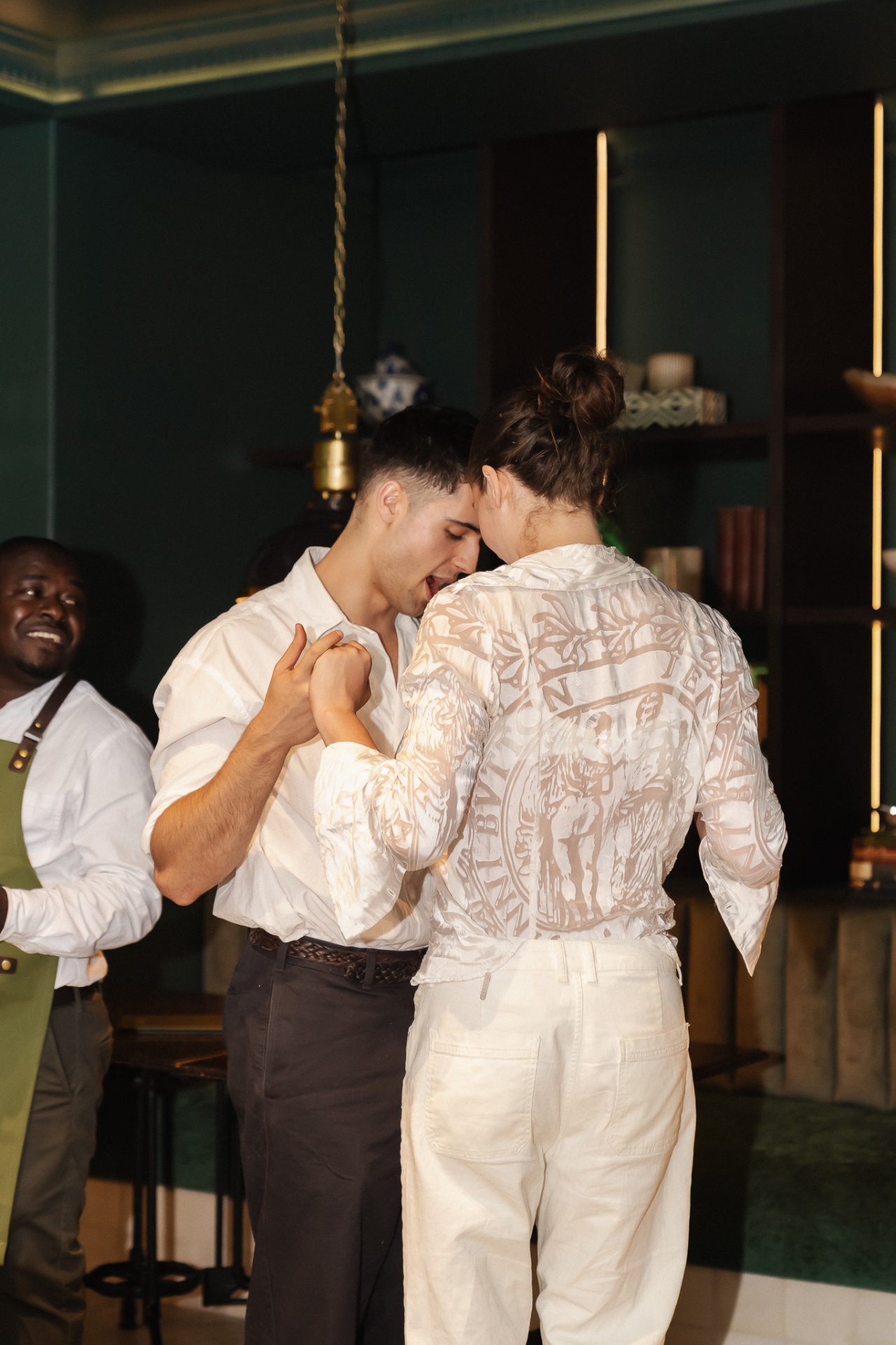 Slow dance on the Noah floor with the bartender smiling in the background