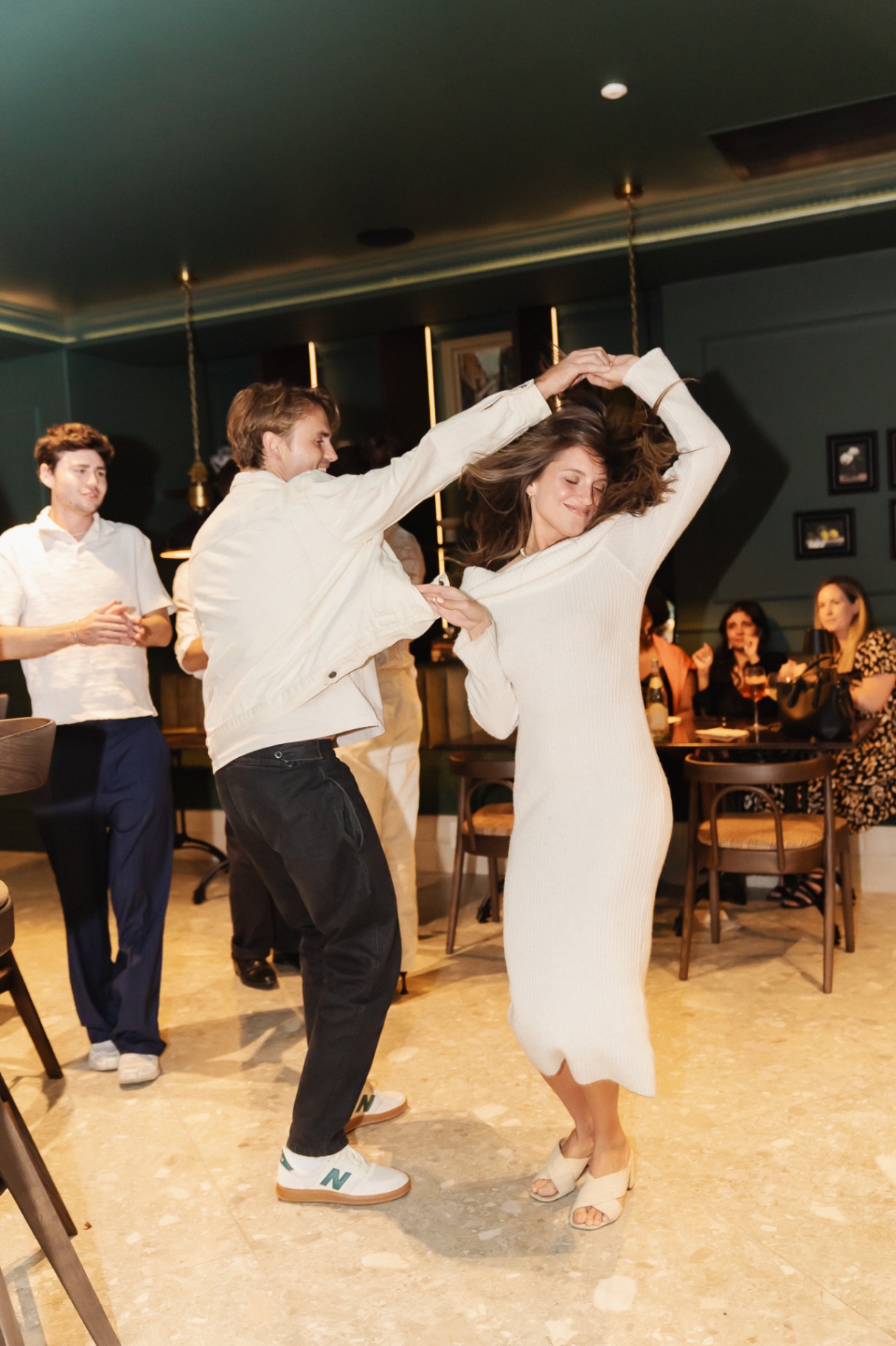 Couple dancing in the Noah dining room on First Thursdays