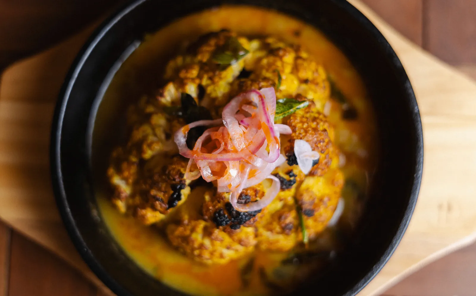 Whole roasted cauliflower with tahini and dukkah
