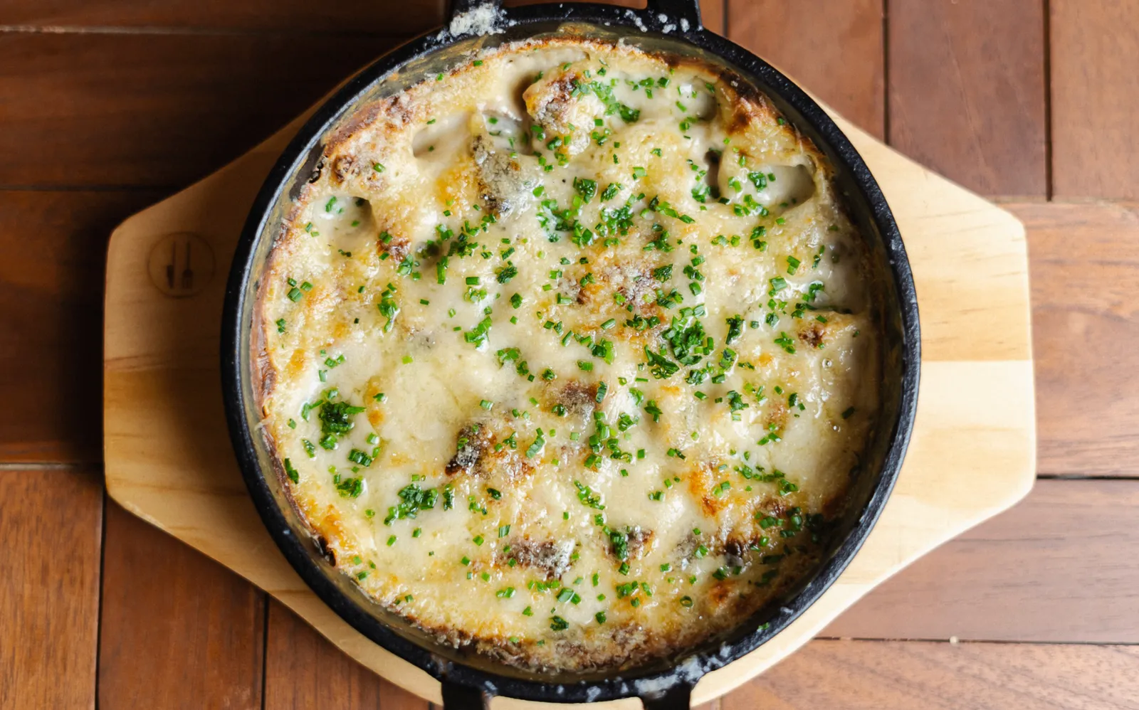 Oven-baked mushrooms with parmesan cream sauce at Noah Cape Town