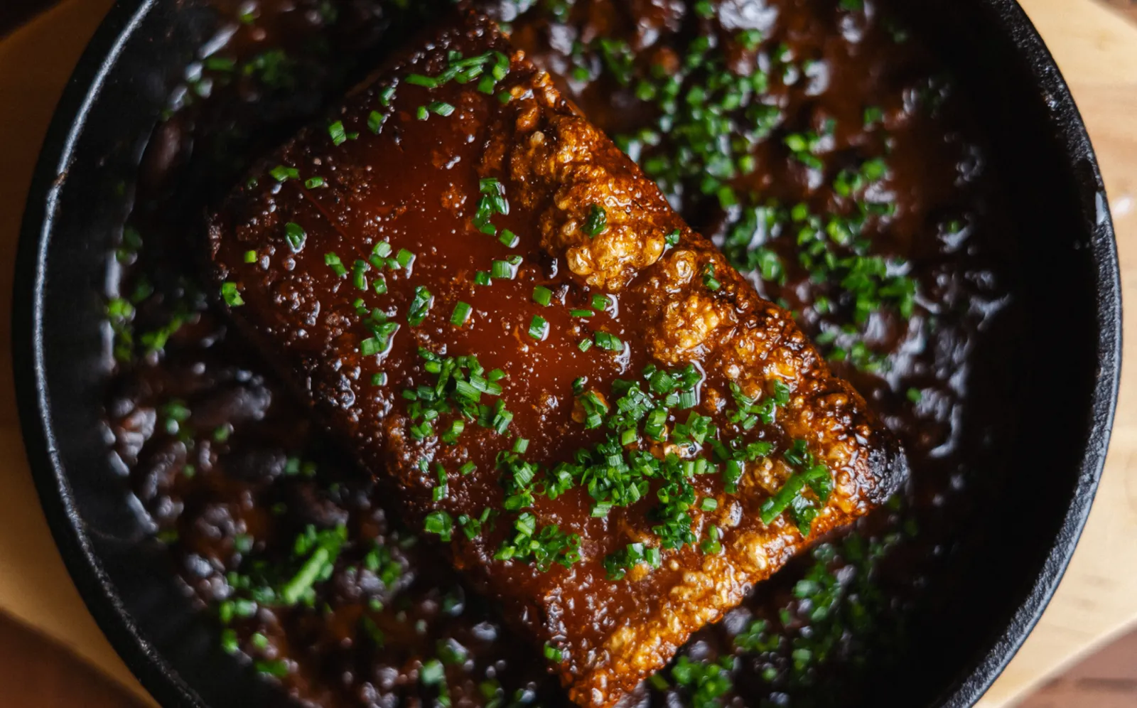 Slow-roasted crispy pork belly with apple jus