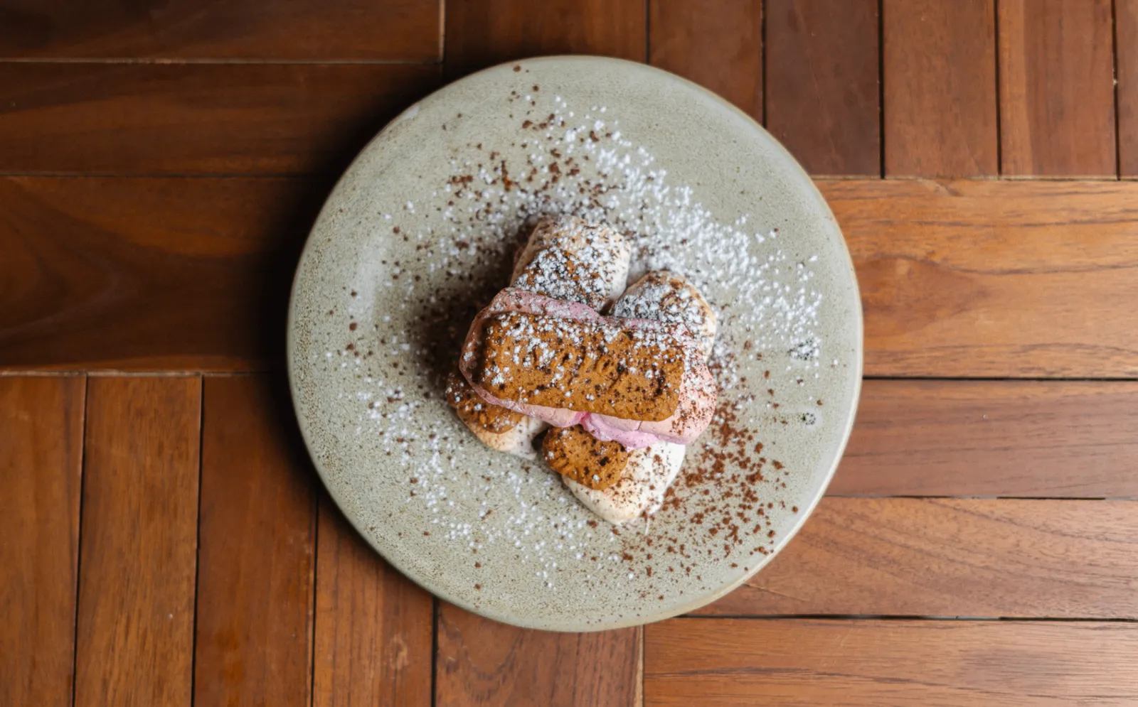 House-made tiramisu dusted with cocoa